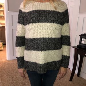 color block cream and black sweater